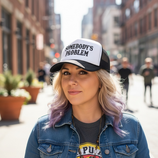 Somebody’s Problem Trucker Hat 😏🖤